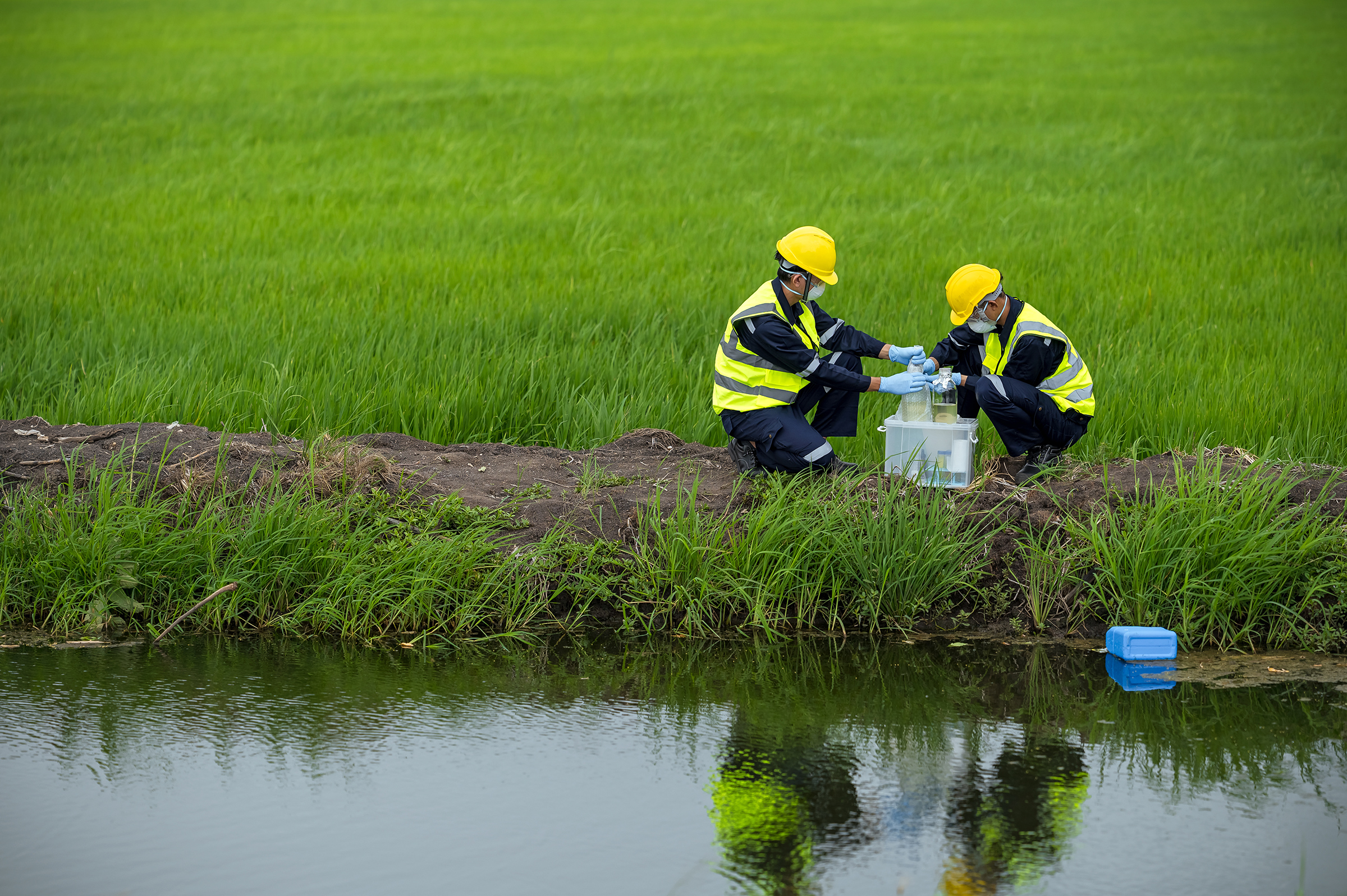 Two Workers Testing Water